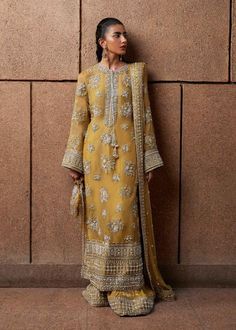 "Explore our stunning collection of Pakistani and Indian wedding dresses and formals. Featuring our Desi Designersjorray  Nikkah Garara, Shalwar Kameez, Anarkali Suits, Sharara Suits, Gharara Suits, Lehenga Choli, Long Gowns and Designer Sarees. Shop online for the latest Pakistani and Indian bridal wear, perfect for your special day. Get ready to shine in our elegant and affordable dresses, designed to make you look Fabulous. Whether you're in the UK or USA, our Pakistani and Indian wedding dresses are just a click away!" Details: Fabric: Net Heavy hand embellished and Spangle work embroidered Shirt Full Embroidered  bordered dupatta ... Sequence Embroider boarder Loose Dhaka pajama Disclaimer:  Product color may slightly vary due to photographic lighting sources or your monitor settings. Nikkah Garara, Yellow Indian Outfit, Asian Fits, Desi Outfits, Traditional Attires, Wedding Dress Organza, Pakistani Fancy Dresses, Desi Clothes, Indian Bridal Wear