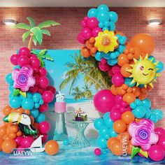 balloons and decorations are arranged in the shape of an arch