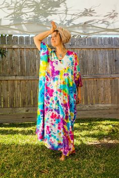 "Add a touch of unique style to your wardrobe with our Hand-Dyed Kaftan Dress! This stunning dress is made from 100% breathable and comfy rayon fabric, ensuring maximum comfort all day long. Using our unique method, each dress is carefully hand dyed, resulting in a one-of-a- kind masterpiece. The intricate patterns and vibrant colors make this dress a true work of art. The kaftan dress comes in a versatile one size fits most (M-3XL), making it extremely comfortable for a wide range of body types. With a bust measurement of up to 60\", you can feel confident that this dress will flatter your figure. The dress measures 55\" in length and 45\" in width, providing a loose and flowing fit that is both stylish and flattering. Featuring a trendy V-neck design and side slits, this slipover style d V-neck Maxi Dress With Natural Dye For Summer, Multicolor Relaxed Fit Maxi Dress For Summer, Oversized V-neck Dress For Festival, Bohemian Hand-dyed Festival Dress, Hand Dyed Bohemian Maxi Dress, Bohemian Hand Dyed Maxi Dress For Festivals, Tie Dye Natural Dye Dress For Beach Cover-up, Bohemian Tie Dye Beach Dress Cover-up, Summer Tie-dye Maxi Dress With Natural Dye