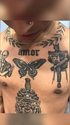 a man has tattoos on his chest and chest