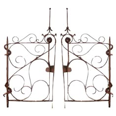 pair of wrought iron gates on white background