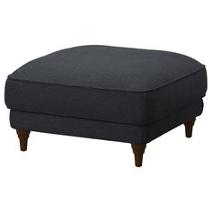 the footstool is upholstered with wood legs and a dark blue fabric