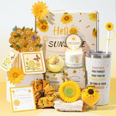 the sunflower gift box is filled with items for someone's special day or birthday