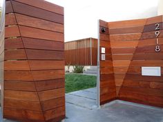 two large wooden doors with numbers on them