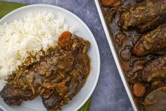 meat and rice on a plate next to a casserole dish in a pan