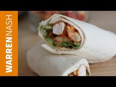 there is a wrap with shrimp and lettuce in it