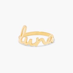 A fun new way to wear the nameplate style! The Nella Nameplate Ring is custom made with your choice of text in a sweet, lowercase script. This delicate, unique ring is available in rose gold, gold, or rhodium-plated sterling silver for a completely personalized piece. Available in sterling silver, 18k gold or 18k rose gold plated sterling silver Band width: 2mm Name height approximately 1/4" (varies with characters) Protected with an anti-tarnish barrier This is a lowercase only font, uppercase Nameplate Ring, Name Ring, Name Rings, Personalized Ring, Unique Ring, Personalized Rings, Sterling Silver Bands, Gold Plated Silver, Beautiful Packaging