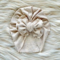 Our Modern Bow Turban hat is the perfect accessory for the stylish baby girl in your life! These hat's are made with only the softest, light weight, stretchy material for the perfect comfortable fit. Enjoy the modern look of the raw edge bow in this adorable turban. Our hat's come in these sizes: Newborn- fits 0-3 months Infant- fits 3-12 months Toddler- 18 months -4 years Youth- fits 5 year- 9 years *Need a different size just message us! All of our turban hats are handmade with care in the USA Bow Turban, Stylish Baby Girls, Year 9, Baby Turban, Turban Hat, Stylish Baby, Baby Hat, Top Knot, Baby Hats