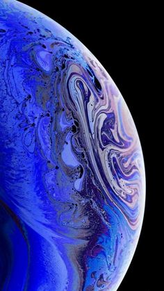 an image of the blue and purple swirls in this iphone wallpaper