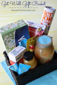 the gift basket is filled with food and snacks