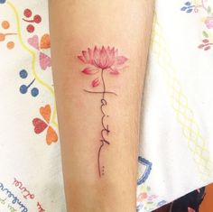 a woman's leg with a tattoo on it that says, love and a flower