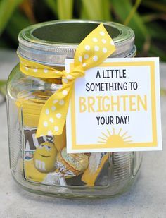 a little something to brighten your day jar filled with yellow candies and cards