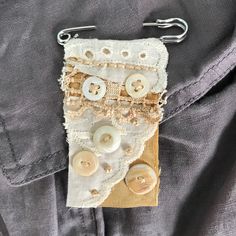 a piece of cloth with buttons attached to it