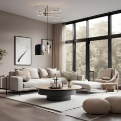 a modern living room with large windows and white furniture