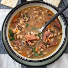 a bowl filled with beans and ham soup