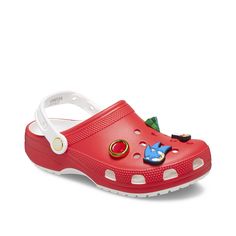 Crocs-Classic Sonic the Hedgehog Clog Finish off your favorite casual looks with the Classic Sonic the Hedgehog clog from Crocs. This piece features the lightweight construction and comfort that the original shoe offers, but is elevated by a bright red color and Jibbitz inspired by the popular video game. Not sure which size to order? Click here to check out our Kids’ Measuring Guide! For more helpful tips and sizing FAQs, click here . Red Crocs, Kids Crocs, Cry Cry, Trending Handbags, Classic Sonic, Sonic Friends, Room Shoes, Red Sandals, Popular Videos