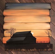 a painting of a barn with trees and sunset in the background on wood planks