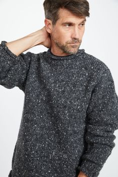 Steeped in the power of heritage and tradition. The Raheen Tweed Roll Neck Sweater is a timeless piece that holds its place in history and the present. Featuring a rolled crew neck collar, hem and cuffs with ribbing at the neck, you’ll find this piece brings a flattering, relaxed fit. Crafted with 100% Pure New Wool with set in sleeves and fully linked seams, the Raheen gives the wearer a perfect, smooth finish. Lurex Sweater, Mens Sweater, Roll Neck Sweater, Sweater Collection, Yarn Shop, Roll Neck, The Present, Wrinkle Free, Neck Collar