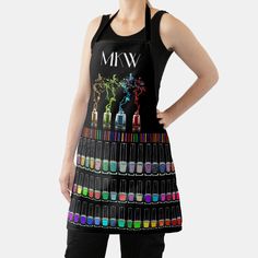 a woman wearing an apron with nail polishes on it