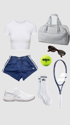 a white shirt, blue shorts and tennis racket are arranged on a gray background