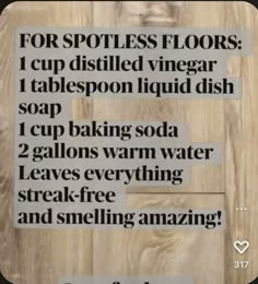 a sign that says for spotless floors i cup distilled vinegar soap 1 cup baking soda 2 gallops warm water leaves