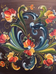 an artistic painting with flowers and swirls on the side of a wooden wall panel