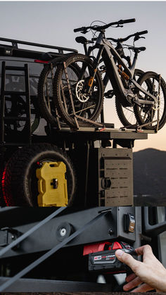 two bikes on the back of a truck