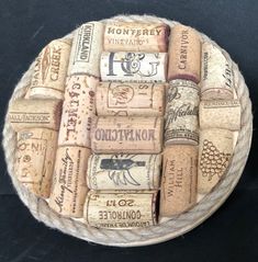 a wine cork tray with many different types of wine bottles on the top and bottom