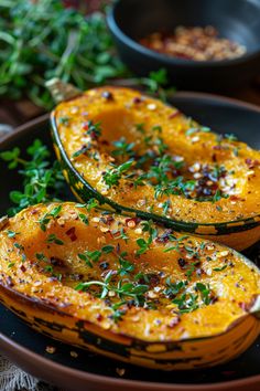 Roasted squash halves garnished with herbs and red pepper flakes. Delicata Squash Recipe Air Fryer, Delicata Squash Air Fryer, Air Fryer Yellow Squash, Air Fryer Squash, Yellow Squash Recipe, Salmon Bites Recipe, Delicata Squash Recipe, Yellow Squash Recipes, Veggies Recipes