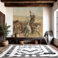 a painting on the wall above a rug in a living room