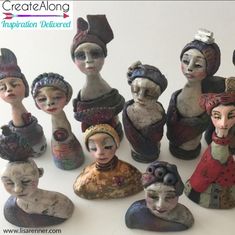 a group of ceramic figurines sitting next to each other