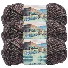 three skeins of yarn with the words home town on them