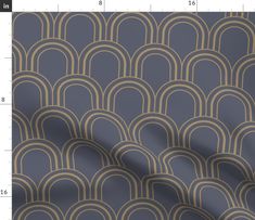 a blue and gold wallpaper with an art deco style pattern on the back ground