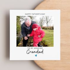 an old man is holding his granddaughter's hand