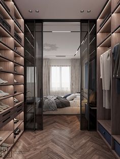 a walk - in closet with wooden shelves and clothes hanging on the walls, along with a bed