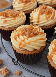 cupcakes with frosting and caramel drizzled on top