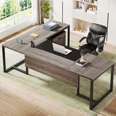 an office desk with a laptop on it and a chair next to it in front of a window