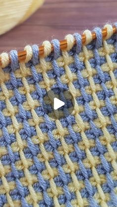 the video shows how to crochet with yarn