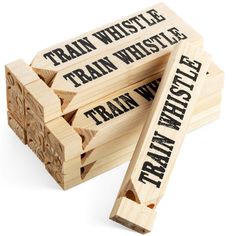 three wooden blocks with words on them sitting next to each other in the shape of train whistles