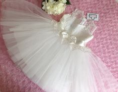 Girls princess lace tutu dress, birthday party, wedding, tulle princess dress, glitter dress, flower girl dress. White lace dress suitable for 1-6 year old girls. For birthday parties, weddings and all your special occasions. High quality lace. Please refer to the size chart when ordering. Dress lengths (from shoulder to knee): 1 year 43 cm, 2 years 48 cm. 3 years 52cm, 4 years 56cm, 5 years 61cm, 6 years 65cm. If you contact us, we can make the hemline to any length you want. Since the dress cuts are made by hand, there may be a difference of +1/2 cm in the measurements given in size and height. Please follow the washing instructions. Do not dry clean. Hand wash only with cold water, do not wring. Do not use bleach. There are no returns or exchanges. We appreciate your patience, but if yo Princess Dress With Lace Bodice And Tulle For Dress-up, Wedding Tutu Dress With Lace Bodice, Lace Bodice Tutu Dress For Wedding, Princess Style Lace Dress With Tulle Skirt, Lace Princess Dress With Tulle Skirt, Lace Tulle Skirt First Communion Pageant Dress, Lace Tulle First Communion Pageant Dress, Fitted Princess Dress With Lace Bodice And Tulle, Princess Style Tutu Dress With Lace Bodice