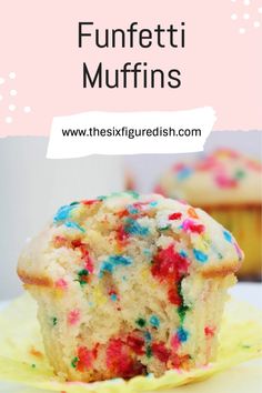 a muffin with sprinkles sitting on top of a yellow plate