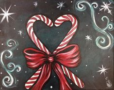 a painting of candy canes in the shape of a heart on a black background