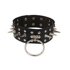 Spiked O-Ring Collar The coolest punk rock sub choker collar with large spikes and a big O-ring at the front. Adjustable strap fits everyone. Metal: Zinc Iron Alloy. Material: Faux Leather. Punk Choker With Spikes, Gothic Spiked Choker For Festivals, Punk Style Spiked Choker, Edgy Choker For Alternative Fashion, Punk Style Spiked Choker Jewelry, Spiked Choker For Concerts, Spiked Choker For Concert, Concert Choker With Spikes, Edgy Black Spiked Choker