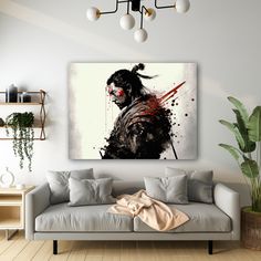 a living room with a couch and a painting on the wall above it's head