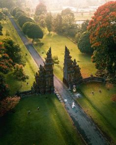 an aerial view of a castle in the middle of a field