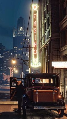 an old car is parked on the side of the street in front of a casino sign