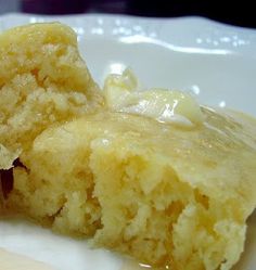 two pieces of cake sitting on top of a white plate