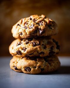 chocolate chip cookies stacked on top of each other