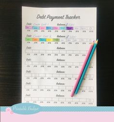 a printable debit payment tracker with colored pencils