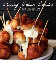 bacon wrapped in cheese and toothpicks on a plate